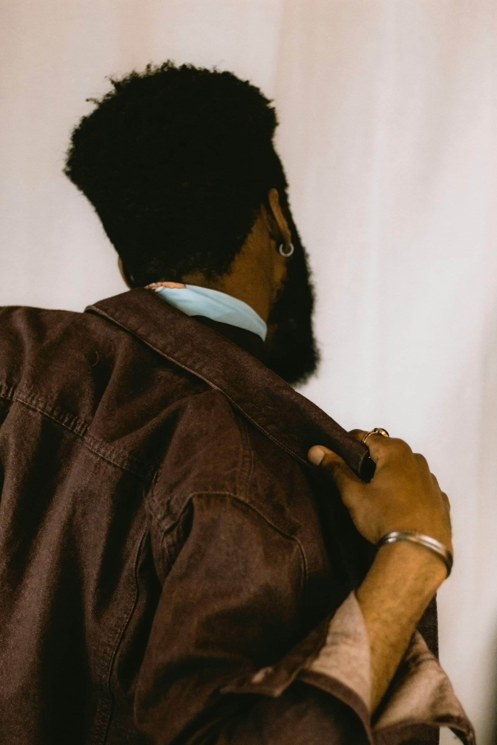 Close detail of a dark brown overshirt